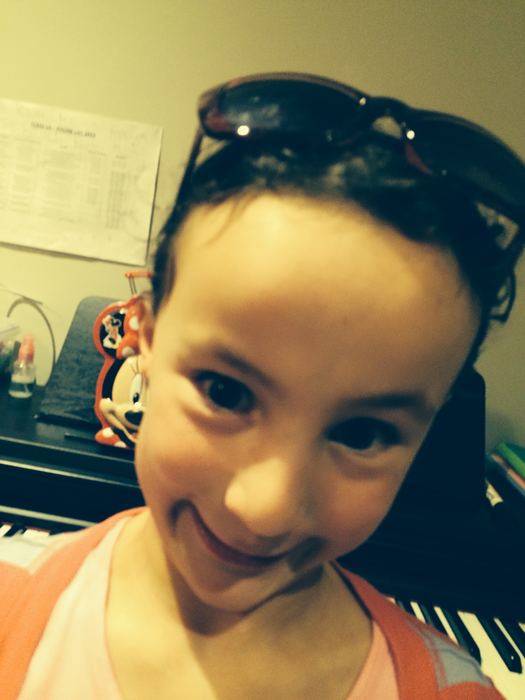 Smiling selfie at the piano