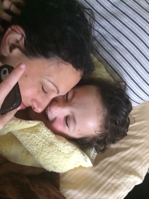 Two people resting on a pillow