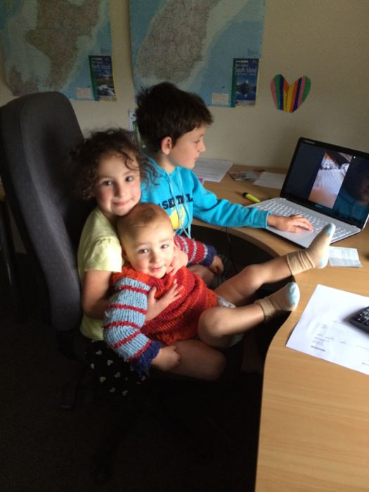 Children watching something on a laptop together