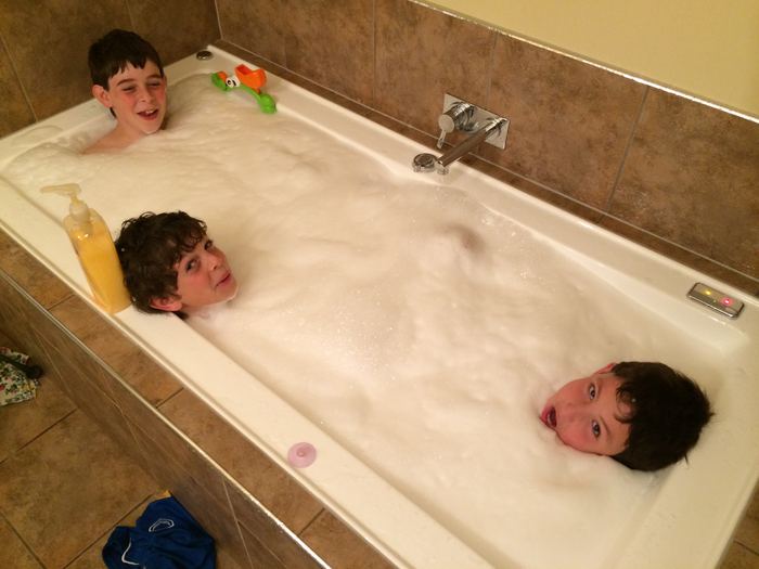 Two children in a bubble bath